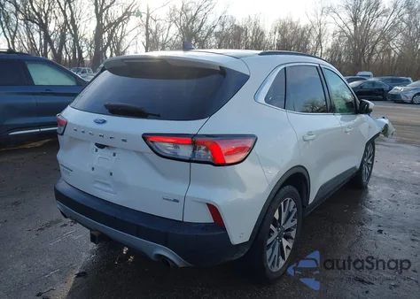 2020 Ford Escape Titanium z USA, uszkodzony, nr VIN 1FMCU9J99LUB09889